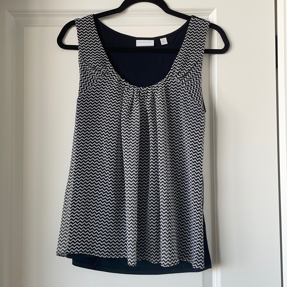 Black and white work blouse. New York & Company size medium.